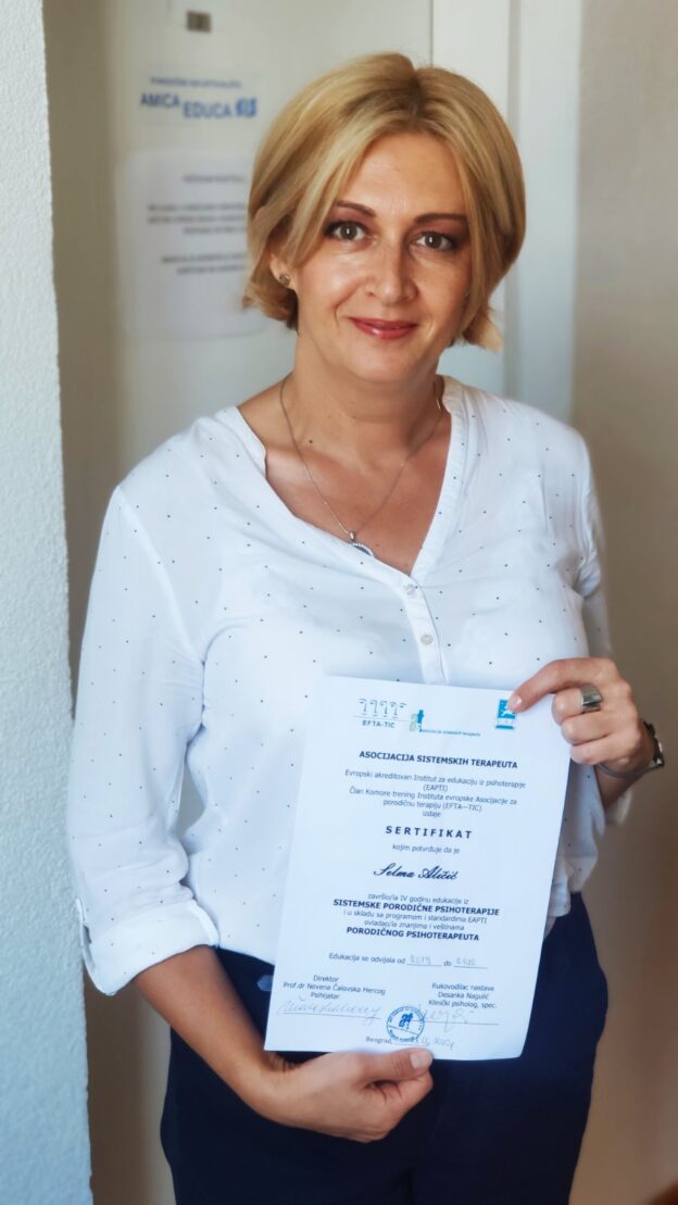 Selma with her certificate